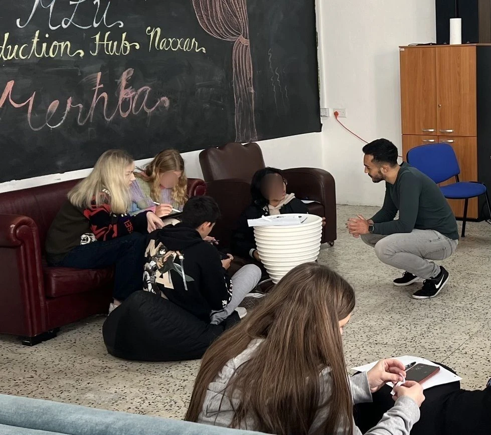 Luke Fenech facilitating an educational activity with students